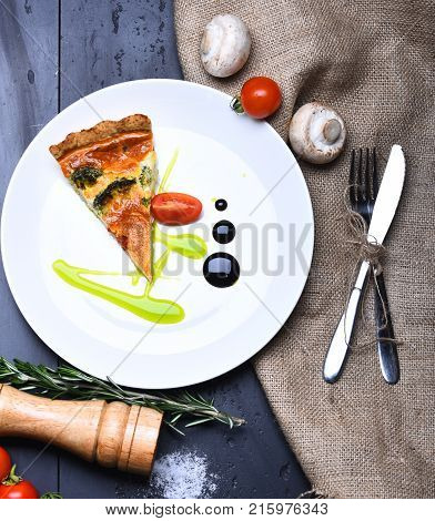 Piece Of Pizza On Grey Texture Background. Homemade Cuisine
