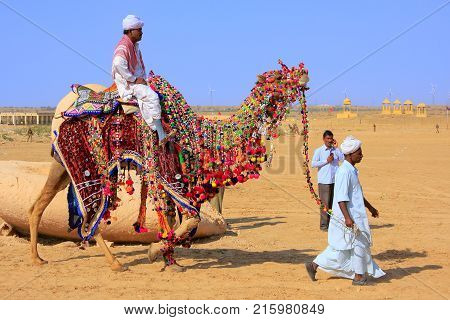 Fatehpur Sikri, India-january 30: Unidentified Man Stands With Donkey Outside Jama Masjid On January