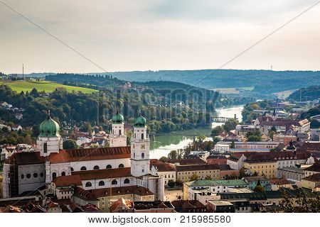 The city of Passau with St. Stephen's Cathedral in the foreground and the Danube River fading into the distance