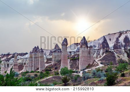 Rising Sun Love Valley Volcanic Mountain Landscape In Cappadocia, Turkey