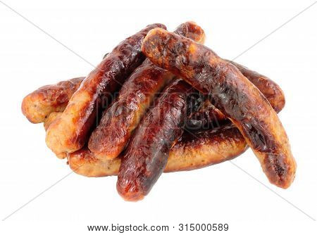 Group Of Grilled Chipolata Sausages Isolated On A White Background
