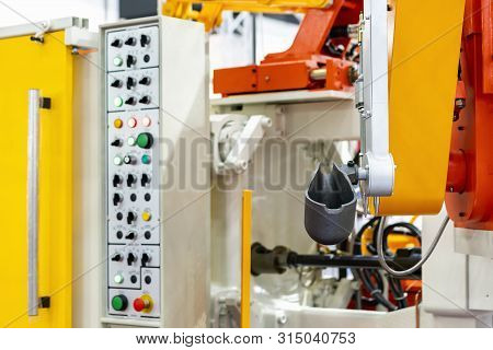 Close Up Ladle And Mechanical Arm Of High Pressure Aluminum Die Cast Machine And Other Detail Such A