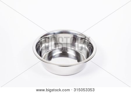 Empty Pet Cup Isolated On White Background. Metal Food And Water Bowl For Cat Or Dog. Proper Feeding