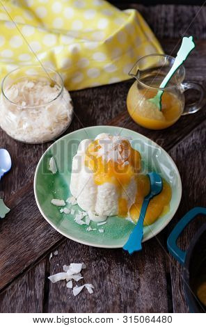 Exotic Vegan Rice Pudding With Coconut And Mango Sauce
