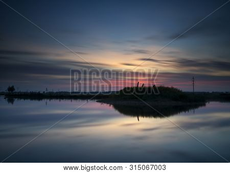 Nice Sunset Above A Small Lake With An Island Near The Dutch Village Sliedrecht