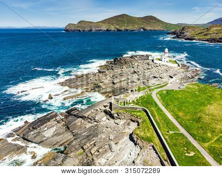 Beautiful View Of Valentia Island Lighthouse At Cromwell Point. Locations Worth Visiting On The Wild
