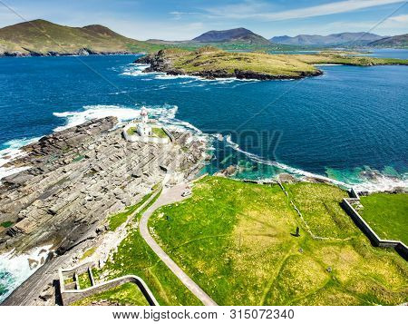 Beautiful View Of Valentia Island Lighthouse At Cromwell Point. Locations Worth Visiting On The Wild