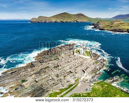 Beautiful View Of Valentia Island Lighthouse At Cromwell Point. Locations Worth Visiting On The Wild