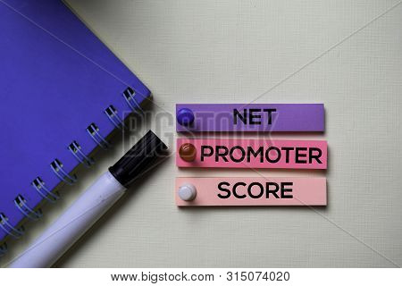 Net Promoter Score - Nps Text On Sticky Notes Isolated On Office Desk