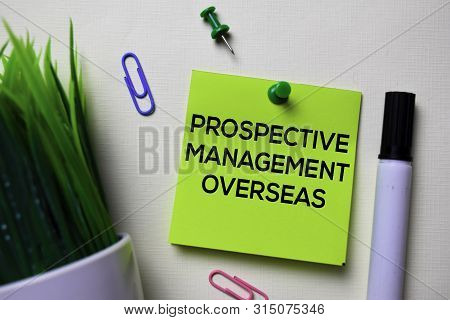 Prospective Management Overseas - Pmo Text On Sticky Notes Isolated On Office Desk
