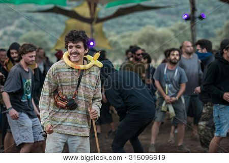 Riomalo De Abajo, Extremadura, Spain - July 15, 2018: A Man With A Yellow Ballon On His Neck Dance A
