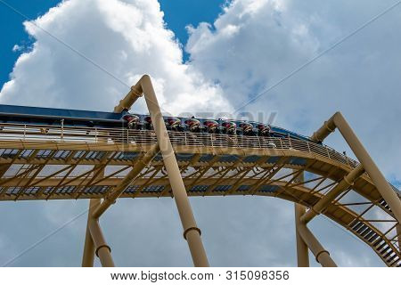 Florida. July 12, 2019 . Top View Of People Enjoying Montu Rollercoaster.