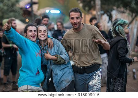 Riomalo De Abajo, Extremadura, Spain - July 15, 2018: A Couple And A Man Looking To The Camera In Th
