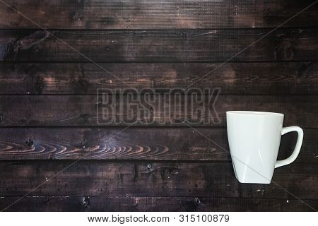 Single Coffee Mug On A Wooden Table Background - Java Espresso With Copy Space