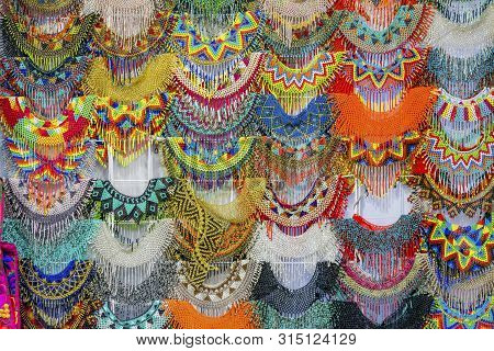 Colorful Mexican Bead Necklaces Handicrafts Red Blue Turquoise Yellow Green Oaxaca Juarez Mexico.