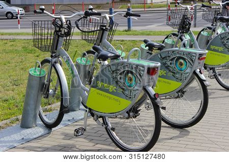 Poland, Belostok - July 13, 2019. Bicycles Are At The Station. Urban Ecological Transport For Hire. 