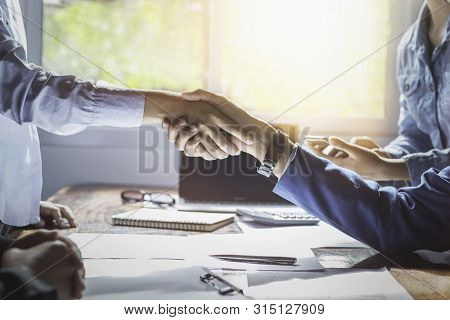 Business People Shaking Hands, Finishing Up A Meeting