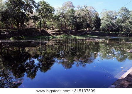 Man-made Lake, The Coast And Bottom Of Which Are Lined With Stone. The Ancient Khmer Reservoir. Bara