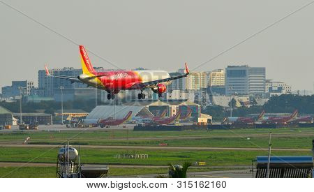 Airplane Landing At Saigon Airport, Vietnam
