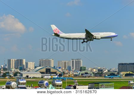 Airplane Landing At Saigon Airport, Vietnam