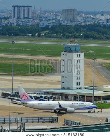 Saigon, Vietnam - Jul 13, 2019. B-18666 China Airlines Boeing 737-800 Taxiing On Runway Of Tan Son N