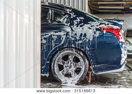 Bangkok, Thailand - March 23, 2019 : Unidentified Car Care Staff Cleaning (clean, Wash, Polish And W