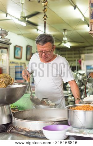 Bangkok, Thailand - March 29, 2019 : Unidentified Asian Chef Cooking A Noodle Soup With Meat Ball (k