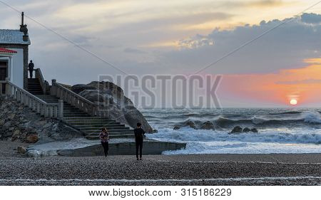 Vila Nova De Gaia, Portugal - April 2018: Sunset View On View On Capella Do Senhor Da Pedra At The A