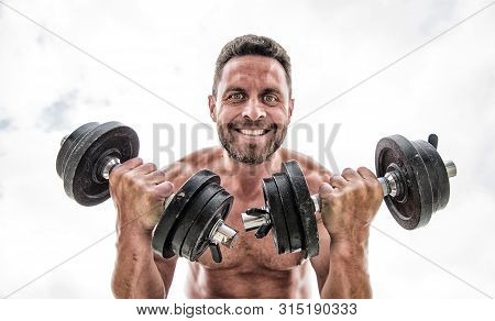 Man Sportsman With Strong Ab Torso. Steroids. Athletic Body. Dumbbell Gym. Muscular Man Exercising W