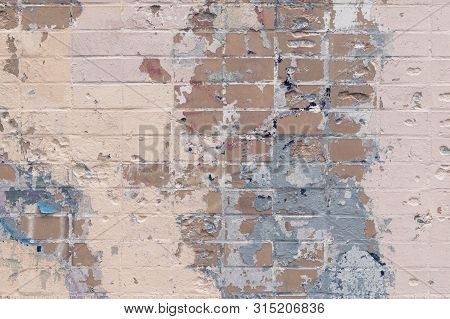 Background Of An Old Brick Wall With Expressive Spots. Inimitable Pattern