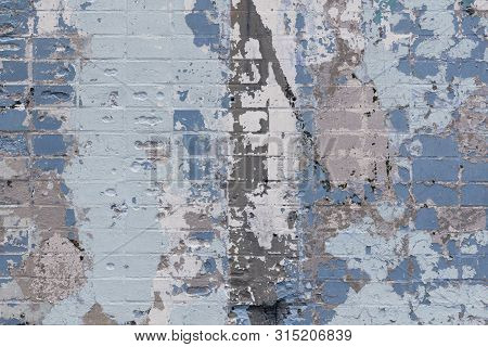 Abstract Background Of An Old Brick Wall With Expressive Spots In Gray And Blue Colors. Inimitable P