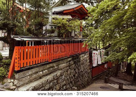 Kyoto, Japan - April 16th, 2018: Various Shrines Along A Mountainside Hike At Fushimi Inari-taisha. 