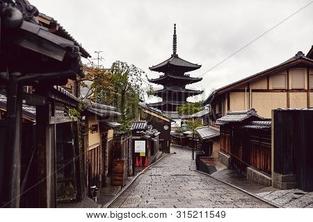 Kyoto, Japan - April 17th, 2018: Street In Kyoto With A View Of The Yasaka Pagoda In The Distance.