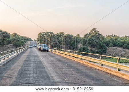Kruger National Park, South Africa - May 7, 2019: Bridge On Road H1-6 Over The Letaba River. Vehicle