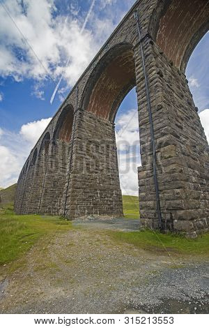 View Of Large Victorian Viaduct In Rural Countryside Scenery