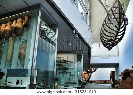 Cartagena, Murcia, Spain- July 26, 2019: Tourists Visiting Archeological Remains In The Underwater M