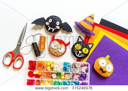 Workshop Devil Felt Toy. Red Devil On A White Background.