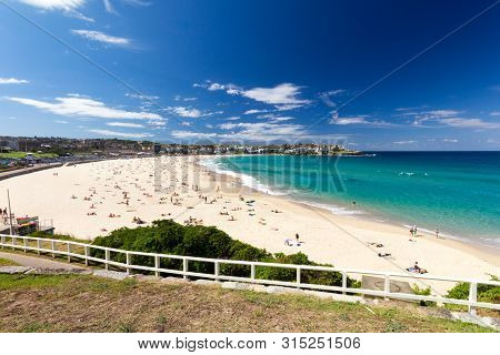 Sydney, Australia - April 2nd 2014: People Enjoying Bondi Beach On A Hot Sunny Day, This Is Australi