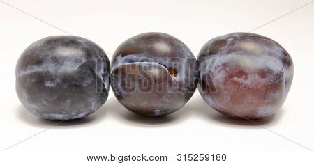 Ripe Plum On A White Background Beautifully Photographed