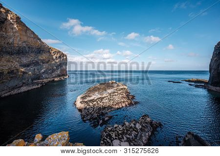 Steep Cliffs And Rocks At The Entrance To Whaligoe Harbour Near Wick In Caithness In Scotland