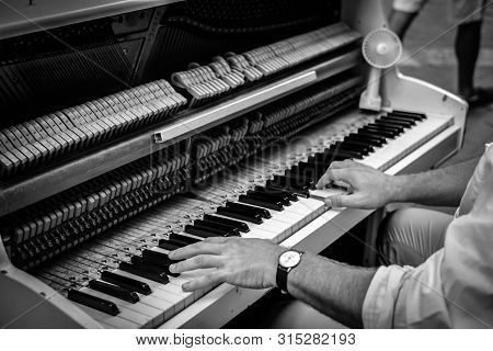 Hands Man Playing The Piano