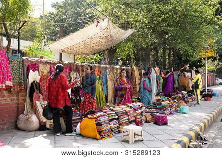 Indian People And Foreigner Travelers Walking Travel Visit And Shopping Product At Janpath And Tibet
