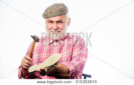 Fits Perfect. Shoemaker At Work. Mature Shoemaker In Workshop Make Shoes. Cobbler Workmanship. Shoem