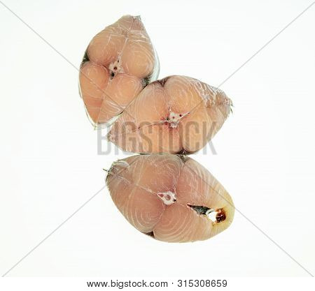 Fish Scomberomorus Pieces Isolated On White Background.