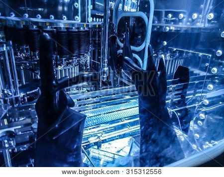 Parts Of Filling Bottles Machine In Drinking Production Factory.