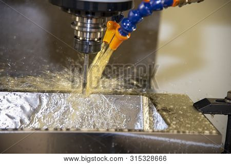 The Cnc Milling Machine Cutting The Tire Mould Part With Solid Ball Endmill Tool. The Mould And Die 