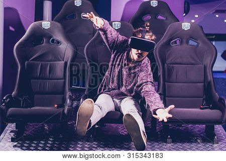 Man In Virtual Glasses Is Watching A Movie In 5D In A Cinema