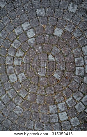 Circular Texture Of Square Stone Floor Called Sanpietrini Or Sampietrini. Urban Cobblestone Paving L