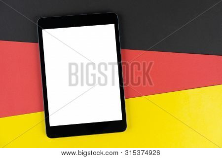 Black Tablet, E-book Is On Flag Germany. Texture Deutsch National Flag Colored Cardboard. Mock Up, C
