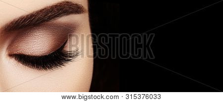 Closeup Macro Of Woman Fashion Make-up Of Eyes. Glitter Blue Celebrate Makeup, Perfect Color Of Eyes